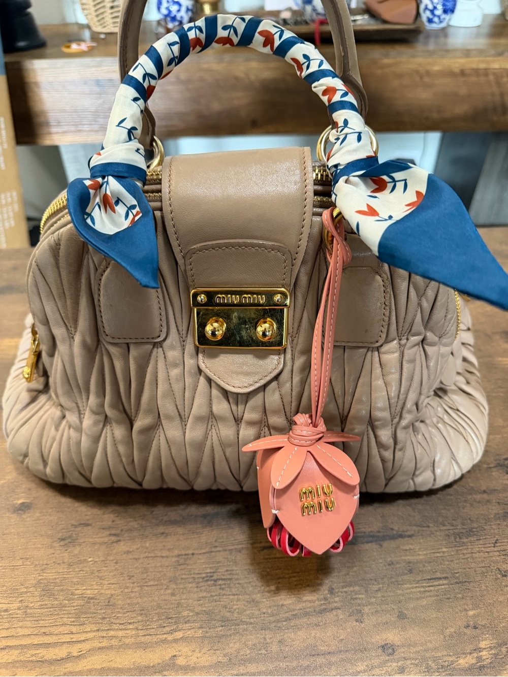 Miu Miu Beige Leather Top-Handle Satchel with Blue Scarf Accent and Pink Charm
